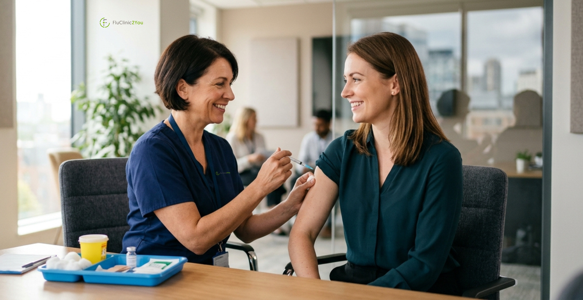 Pharmacist delivering an on-site flu vaccination in the 2026/27 season, FluClinic2You